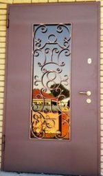 Дверь входная Кованная крупный узор, стекло (артикул ДВК-07)