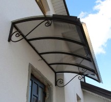 Металлический козырек односкатный дугообразный с декором (артикул МКС14)