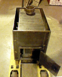 Печь отопительная с песчаной засыпкой