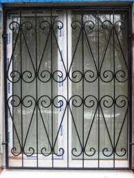 Решетка оконная гухая с ковкой