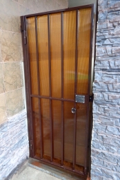 Дверь-решетка защитная уличная с поликарбонатом